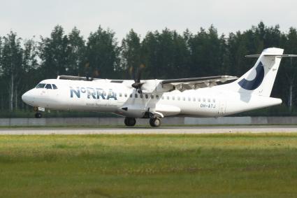 Санкт-Петербург. Пассажирский самолет Airbus авиакомпании `Nordic Regional AirLines` на взлетной полосе.