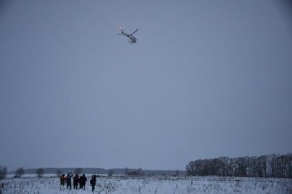 Московская область. На месте крушения пассажирского самолета Ан-148 `Саратовских авиалиний`. Пассажирский самолет Ан-148 `Саратовских авиалиний` с бортовым номером RA-61704 потерпел крушение после вылета из московского аэропорта Домодедово в Орск.