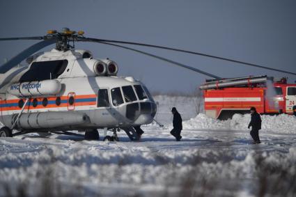 Московская область. Работа сотрудников МЧС России на месте крушения пассажирского самолета Ан-148 `Саратовских авиалиний`. Пассажирский самолет Ан-148 `Саратовских авиалиний` с бортовым номером RA-61704 потерпел крушение после вылета из московского аэропорта Домодедово в Орск.