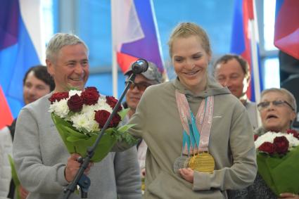 Москва.  Спортсменка Екатерина Румянцева на церемонии встречи  российских спортсменов - участников  XI зимних Паралимпийских игр в аэропорту Шереметьево.