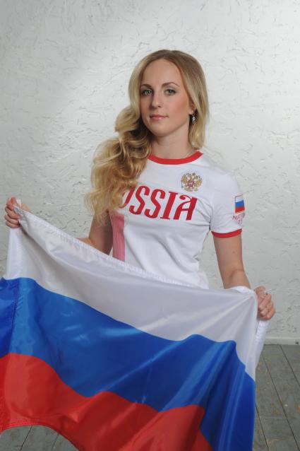 Москва. Олимпийская чемпионка по синхронному плаванию Мария Шурочкина в фотосессии для журнала `Телепрограмма`.