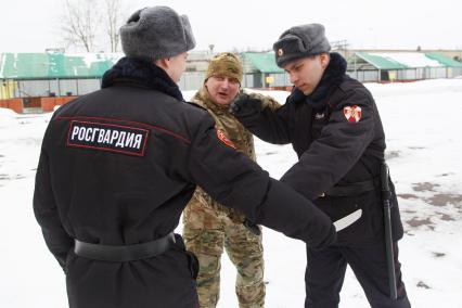 Санкт-Петербург.  Бойцы Росгвардии  во время тренировки  на учебно тренировочной базе.