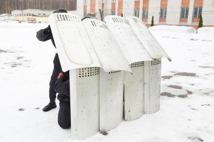 Санкт-Петербург.  Бойцы Росгвардии  во время тренировки  на учебно тренировочной базе.