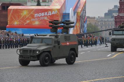Москва.  Многоцелевой бронеавтомобиль повышенной проходимости `Тигр-М` с противотанковым ракетным комплексом (ПТРК) Корнет-Д на Красной площади  во время генеральной репетиции  военного  парада, посвященного 73-й годовщине Победы в Великой Отечественной войне.