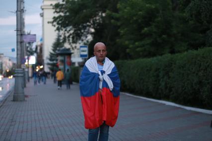 Красноярск.  Болельщик сборной России перед просмотром трансляции матча 1/4 финала чемпионата мира по футболу между сборными России и Хорватии.