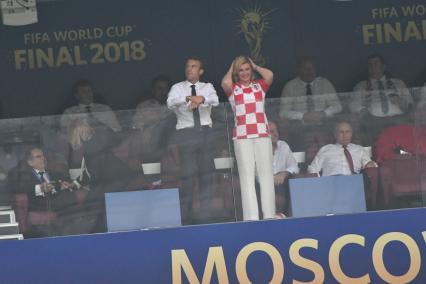 Москва. Президент Франции Эммануэль Макрон, президент Хорватии Колинда Грабар-Китарович, президент РФ Владимир Путин (слева направо) во время финального матча ЧМ-2018 между сборными Франции и Хорватии.