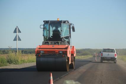 Красноярский край. Во время укладки асфальта.