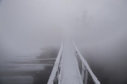 Красноярский край, Лесосибирск. Гидротермическая обработка леса перед подачей на распил на территории одного из самых крупных производителей пиломатериалов АО `Лесосибирский ЛДК #1`.