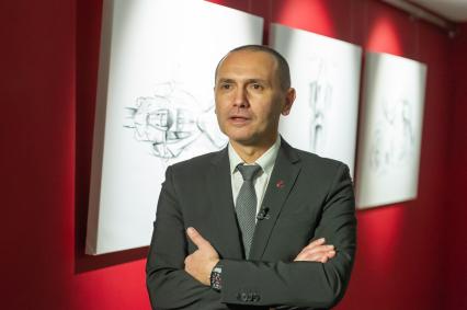 Санкт-Петербург.  Директор Ducati Design Center Андреа Феррарези в музее современного искусства `Эрарта`, где открылась первая в России выставка мотоциклов Ducati  .