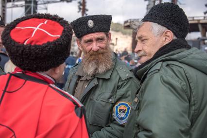 Крым, Симферополь.   Во время праздничного мероприятия, посвященного пятой годовщины проведения Общекрымского референдума и воссоединения Крыма с Россией, после окончания автопробега на горе Гасфорта.