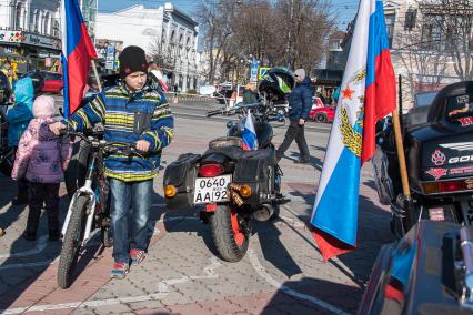 Крым, Симферополь. Во время праздничного мероприятия, посвященного пятой годовщины проведения Общекрымского референдума и воссоединения Крыма с Россией, после окончания автопробега на горе Гасфорта.