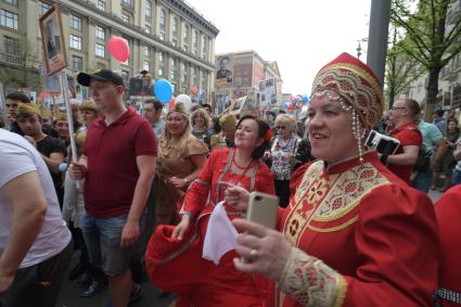 Москва. Участники акции `Бессмертный полк` на Тверской улице.