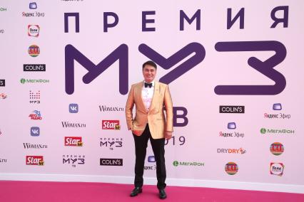 Диск335. ДС МЕГАСПОРТ. Церемония вручения ПРЕМИИ МУЗ-ТВ 2019. МУЗЫКА ОБЪЕДИНЯЕТ. На снимке: генеральный директор телеканала МУЗ-ТВ Арман Давлетьяров