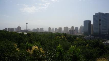 Китай, Урумчи. Вид с Красного холма на город.  A city view of Urumqi, the capital of the Xinjiang Uygur Autonomous Region of China, from the top of the Red Hill.