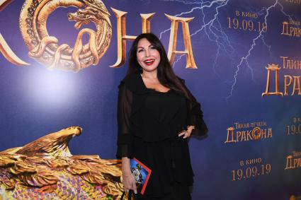 Москва. Актриса Наталья Бочкарева на премьере фильма `Тайна печати дракона`в кинотеатре `Каро 11 Октябрь`.