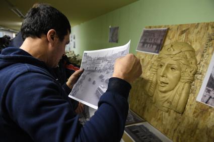 Москва.  Реставрация декоративных элементов  кинотеатра `Художественный`.