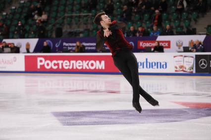 Красноярск.  Спортсмен Дмитрий Алиев во время выступления в короткой программе мужского одиночного катания на чемпионате России по фигурному катанию в ледовом дворце `Платинум Арена Красноярск`.