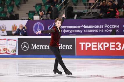 Красноярск.  Спортсмен Дмитрий Алиев во время выступления в короткой программе мужского одиночного катания на чемпионате России по фигурному катанию в ледовом дворце `Платинум Арена Красноярск`.