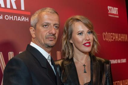 Москва. Режиссер Константин Богомолов и его супруга телеведущая Ксения Собчак на премьере второго сезона сериала режиссера К. Богомолова `Содержанки`.