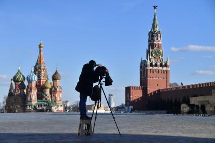 Москва. Фотограф на Красной площади.