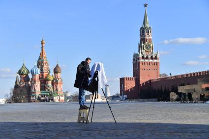 Москва. Фотограф на Красной площади.