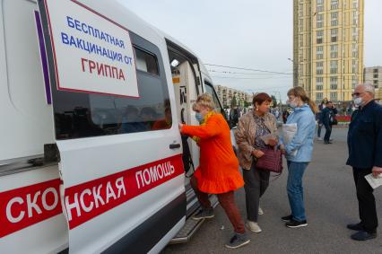 Санкт-Петербург. Проведение бесплатной вакцинации от ГРИППа в передвижном прививочном пункте.