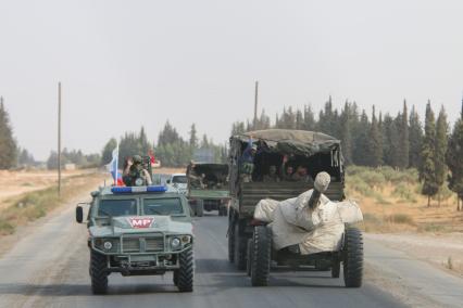 Сирия. Российская военная полиция патрулирует трассу М-4 на севере Сирии.