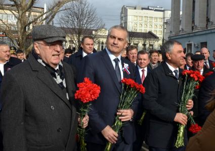 Крым.  Глава Республики Крым Сергей Аксенов( в центре), спикер Госдумы РФ Вячеслав Володин (справа) и руководитель фракции политической партии ЛДПР Владимир Жириновский (слева ) во время фестиваля `Крымская весна`посвященного 5-летию Общекрымского референдума 2014 года и воссоединения Крыма с Россией.