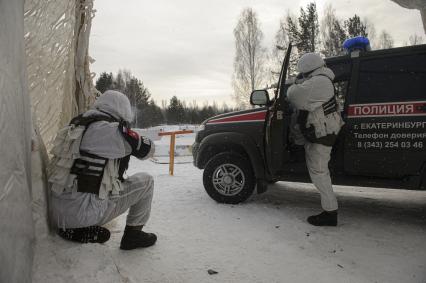 Екатеринбург. Свердловский танковый полигон. Военнослужащие военной полиции во время тактико-специальных учений по отражению нападения боевиков на блокпост, в рамках конкурса международных армейских игр Арми-2021 \'Страж порядка\'