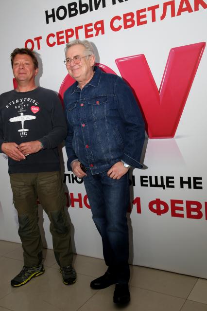 Кинотеатр КАРО ОКТЯБРЬ. Премьера фильма LOVE. 2021. На снимке: актеры Ян Цапник и Юрий Стоянов (справа)