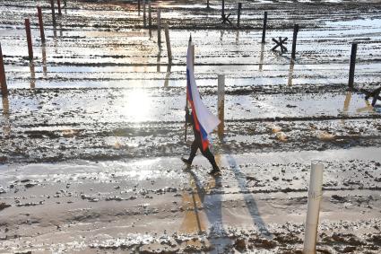 Московская область. Алабино.  Член танкового экипажа из России  во время финальных соревнований танковых экипажей в рамках конкурса `Танковый биатлон-2021` на полигоне  Алабино  в рамках VII Армейских международных игр `АрМИ-2021`.