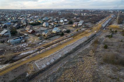 Вологодская область. Великий Устюг. Корреспонденты `Комсомольской правды` Владимир Ворсобин и Иван Макеев путешествуют автостопом по России. Строительство дороги.