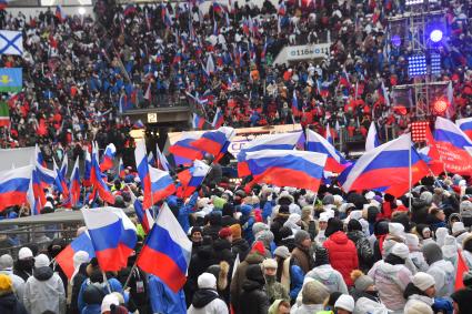 Москва.   Зрители на митинге-концерте `Слава защитникам Отечества` в Лужниках, посвященном участникам специальной военной операции и празднованию Дня защитника Отечества.