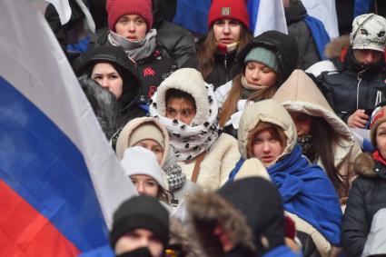 Москва. Зрители на митинге-концерте`Слава защитникам Отечества` в Лужниках, посвященном участникам специальной военной операции и празднованию Дня защитника Отечества.