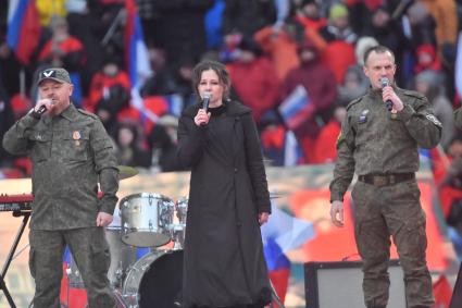 Москва.  Актриса Полина Агуреева  во время митинг-концерта `Слава защитникам Отечества` в Лужниках, посвященного участникам спецоперации и празднованию Дня защитника Отечества.