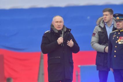 Москва.  Президент РФ Владимир Путин  в Лужниках во время выступления на митинге-концерте `Слава защитникам Отечества`, посвященном участникам специальной военной операции и празднованию Дня защитника Отечества.