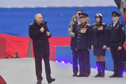 Москва. Президент РФ Владимир Путин в Лужниках во время выступления на митинге-концерте `Слава защитникам Отечества`, посвященном участникам специальной военной операции и празднованию Дня защитника Отечества.