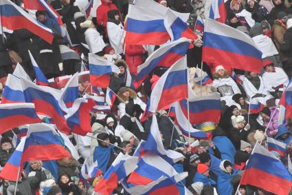 Москва. Зрители на  митинг-концерта`Слава защитникам Отечества` в Лужниках, посвященного участникам спецоперации и празднованию Дня защитника Отечества.