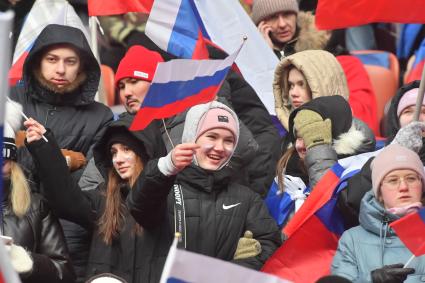 Москва. Зрители  во время митинг-концерта `Слава защитникам Отечества` в Лужниках, посвященного участникам спецоперации и празднованию Дня защитника Отечества.