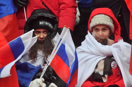 Москва. Зрители на митинге-концерте`Слава защитникам Отечества` в Лужниках, посвященном участникам специальной военной операции и празднованию Дня защитника Отечества.