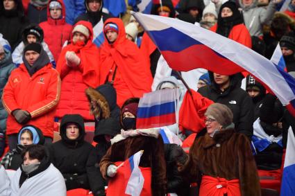 Москва.   Зрители на митинге-концерте `Слава защитникам Отечества` в Лужниках, посвященном участникам специальной военной операции и празднованию Дня защитника Отечества.