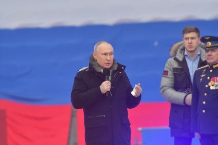 Москва. Президент РФ Владимир Путин в Лужниках во время выступления на митинге-концерте `Слава защитникам Отечества`, посвященном участникам специальной военной операции и празднованию Дня защитника Отечества.