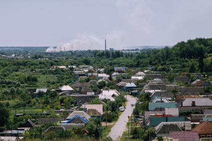 Белгородская область. г.Шебекино. Последствия обстрелов ВСУ. Дым в небе над городом.