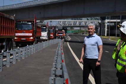 Москва.  Мэр Москвы Сергей Собянин на открытии нового участка Московского скоростного диаметра у станции МЦД Печатники.