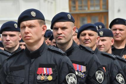 Москва.  Военнослужащие перед обращением президента РФ Владимира Путина  к подразделениям Министерства обороны РФ, Федеральной службы войск национальной гвардии, Федеральной службы безопасности, Министерства внутренних дел и Федеральной службы охраны, которые обеспечили порядок и законность во время мятежа.