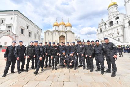 Москва.  Военнослужащие перед обращением президента РФ Владимира Путина  к подразделениям Министерства обороны РФ, Федеральной службы войск национальной гвардии, Федеральной службы безопасности, Министерства внутренних дел и Федеральной службы охраны, которые обеспечили порядок и законность во время мятежа.