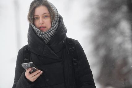 Последствия снегопада в городе.