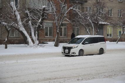 Последствия снегопада в Красноярске