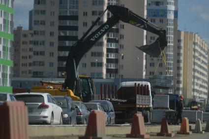 Строительство дороги в новом районе города