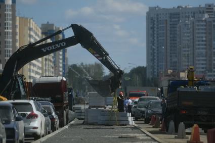 Строительство дороги в новом районе города